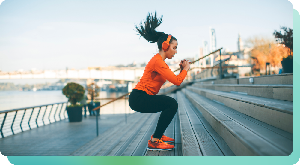 Woman working out on an outdoor staircase